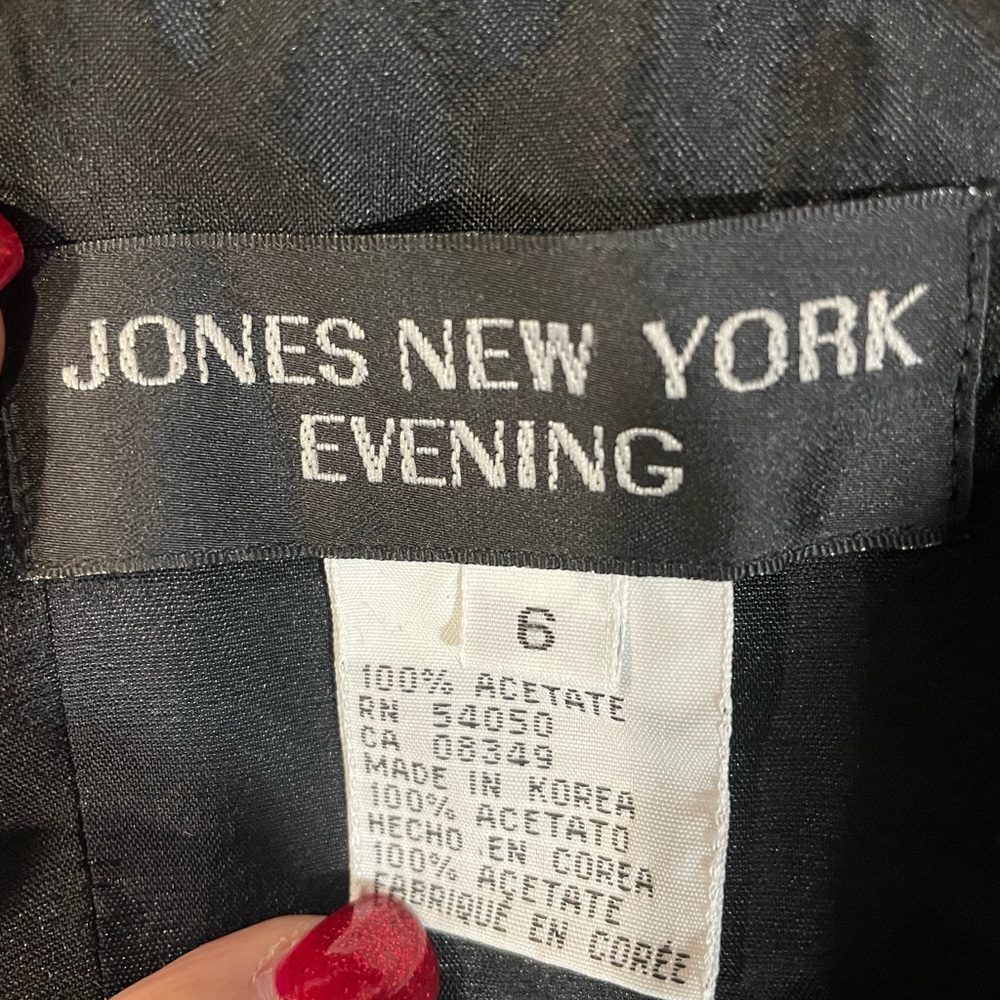 NEVER WORN..gorgeous black gown...attached over skirt...can be strapless...